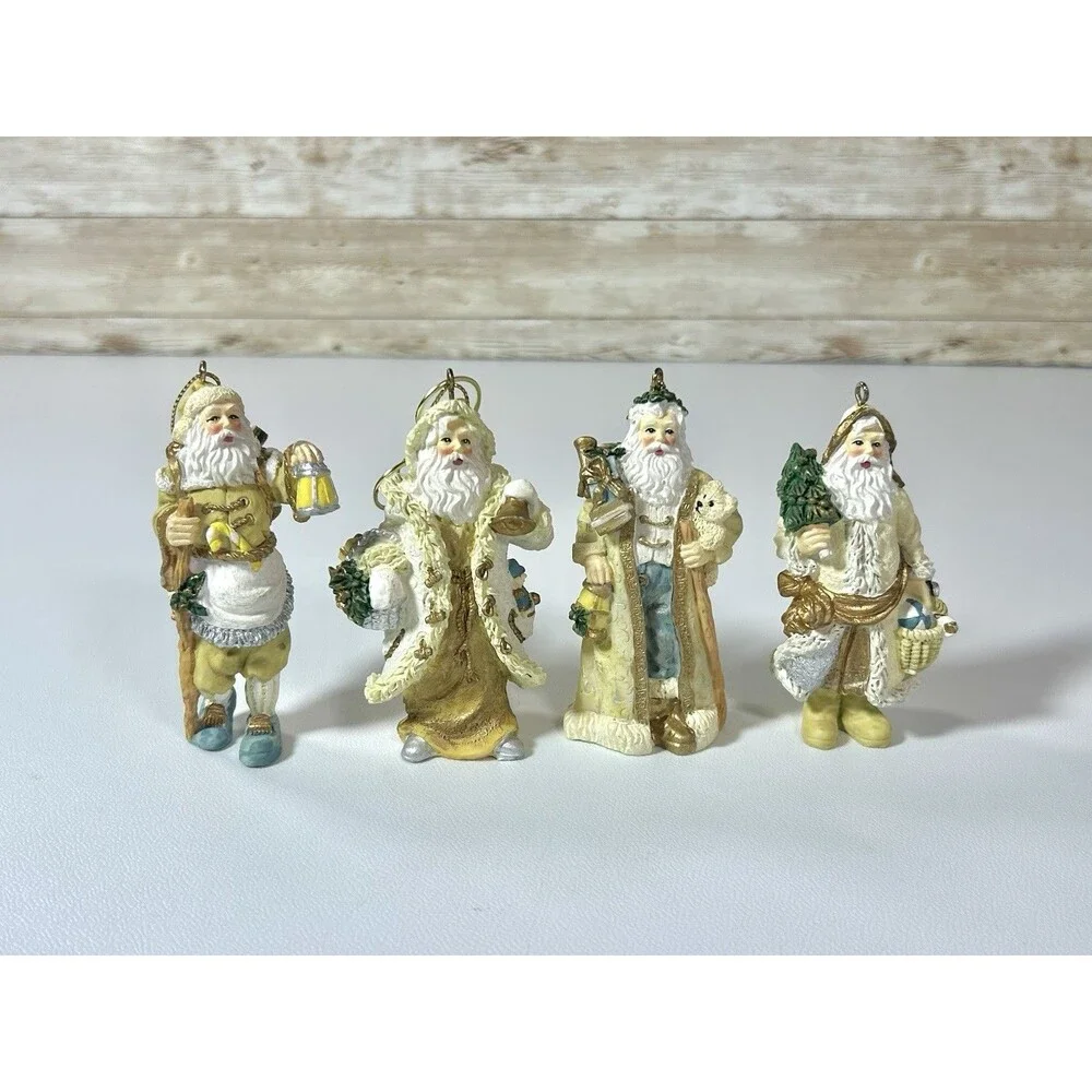 Lot of 4 Santa Figures Christmas Ornaments White Cream Gold Coats Decor